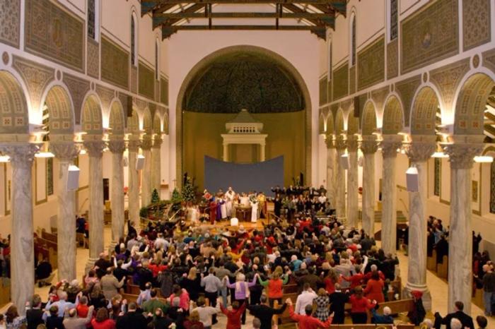 The congregation of St. Monica Church celebrating mass.