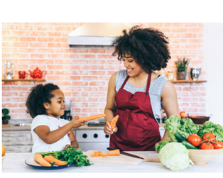 Mother and daughter making nutritious meal
