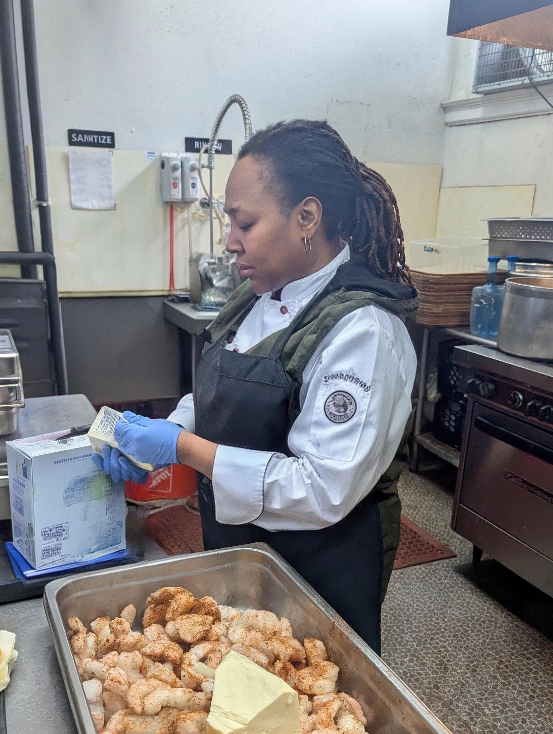 Volunteers serving food at the lunch counter.