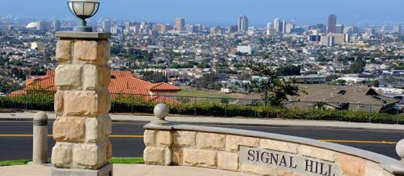Panoramic view from Signal Hill hilltop overlooking Long Beach skyline and the Pacific Ocean