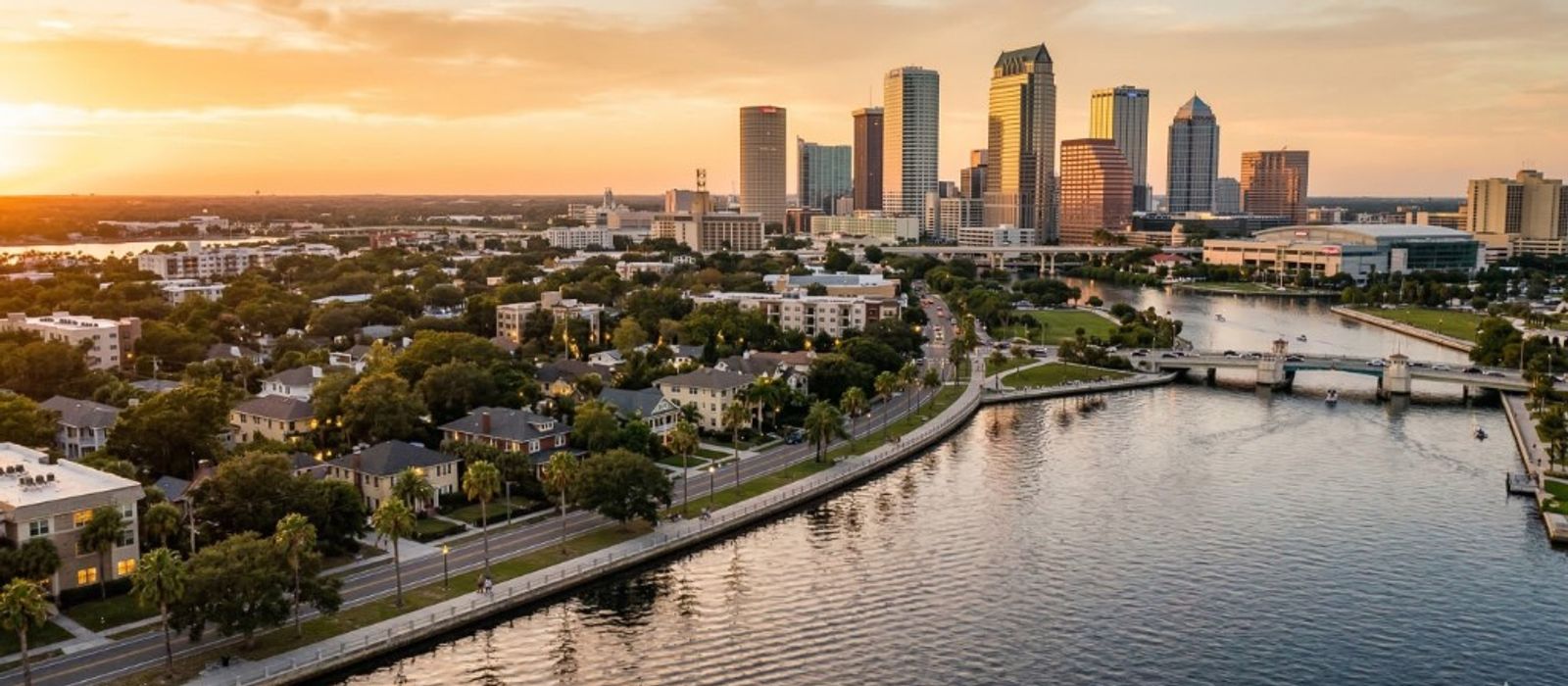 Aerial view of Tampa skyline along the Hillsborough River at golden hour