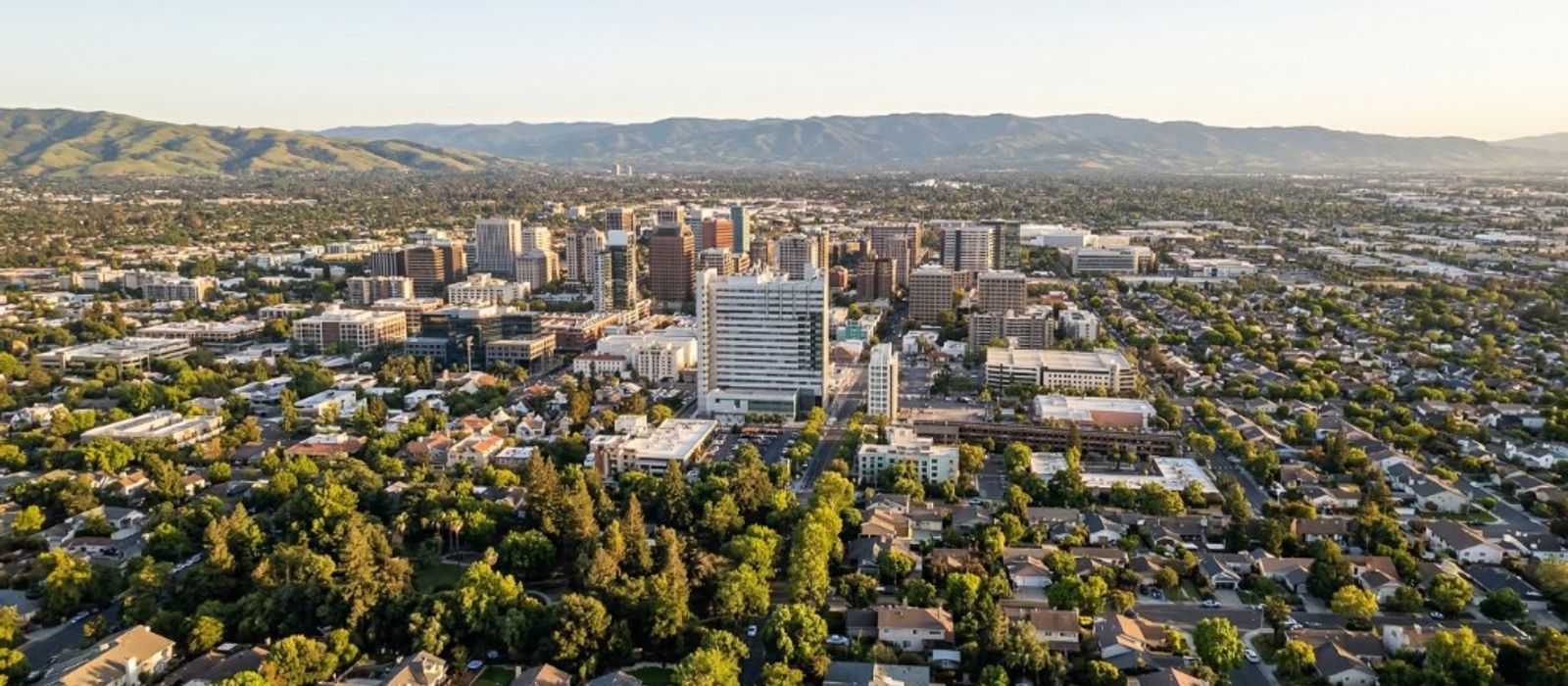 Aerial view of downtown San Jose and Silicon Valley with Diablo Range foothills