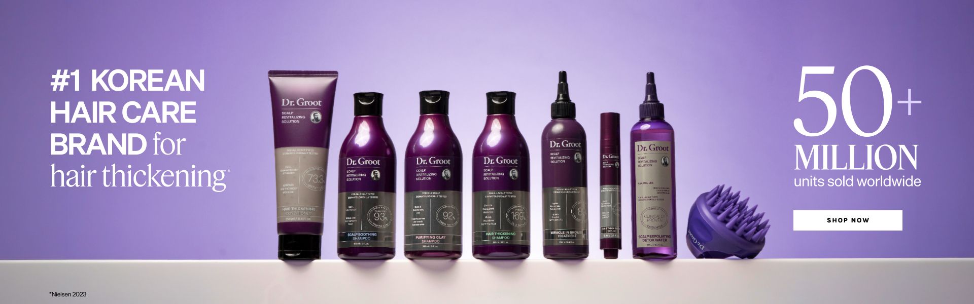 A lineup of purple hair thickening products and a scalp massager with text stating "#1 Korean Hair Care Brand" and "50+ Million units sold worldwide."