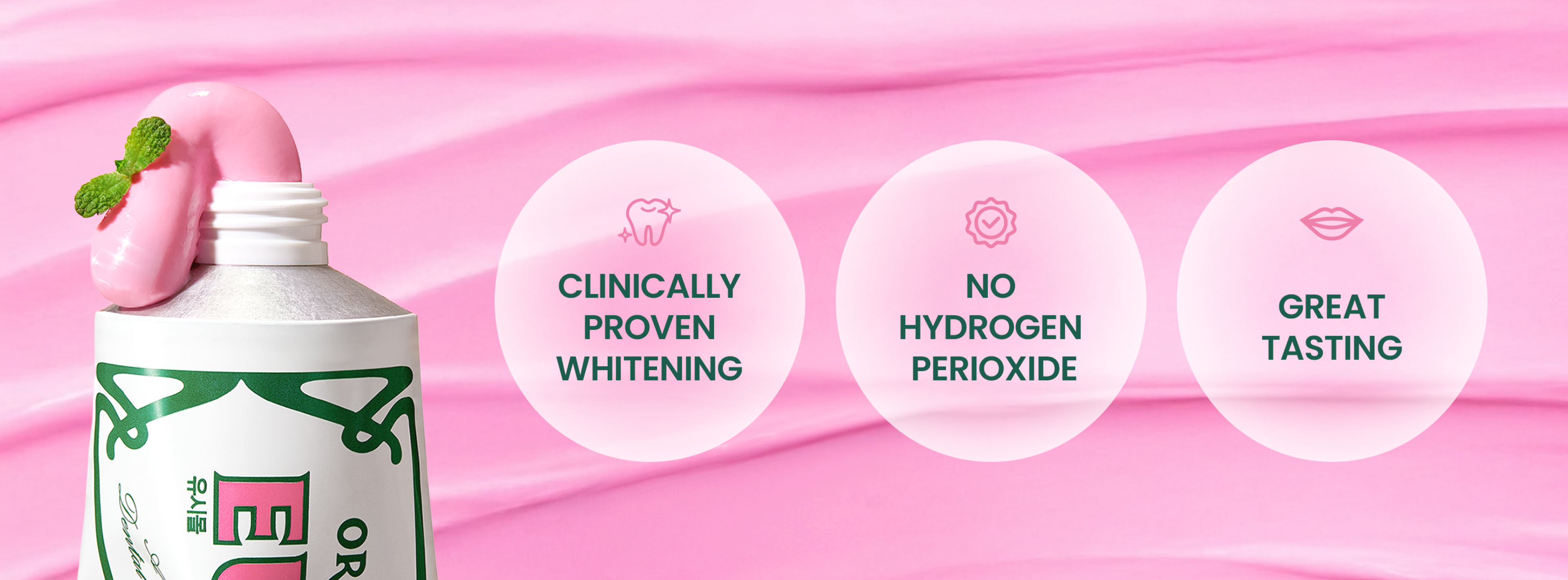 Pink toothpaste tube with a mint leaf, next to bubbles stating "Clinically proven whitening," "No hydrogen peroxide," and "Great tasting."