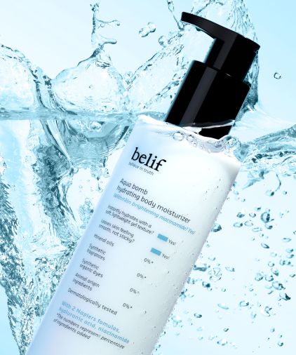 A tube of belif Aqua Bomb Hydrating Body Moisturizer falling with a splash into a pool of water