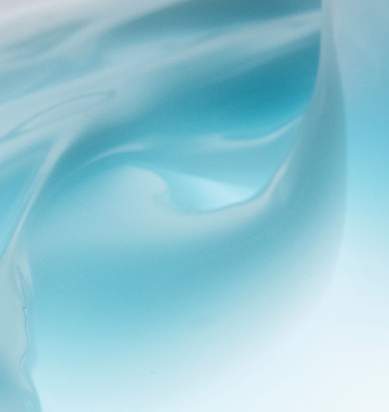 A closeup of a rich, creamy light blue texture.