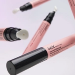 Multiple pink belif Aqua bomb lifting eye gel tubes with black caps, some open to white pump applicators, are shown floating.