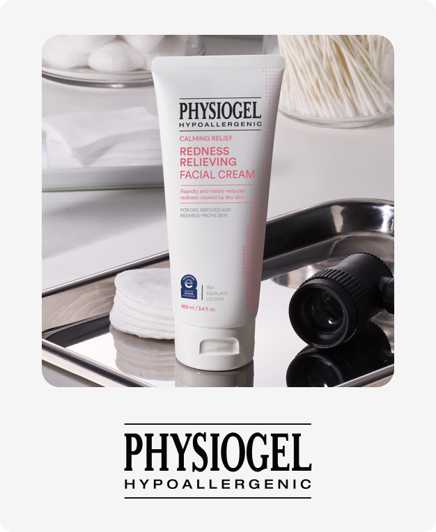 A white tube of Physiogel Hypoallergenic Redness Relieving Facial Cream on a silver tray with cotton pads.