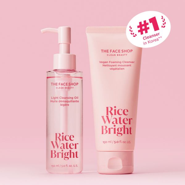 Two pink The Face Shop Rice Water Bright cleansers: a light cleansing oil and a vegan foaming cleanser. A badge says '#1 Cleanser in Korea'.