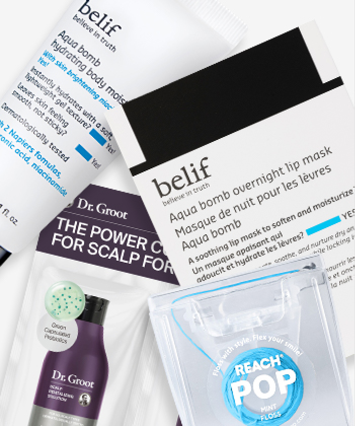 Samples of belif, Dr. Groot, and Reach POP products piled together on a white surface