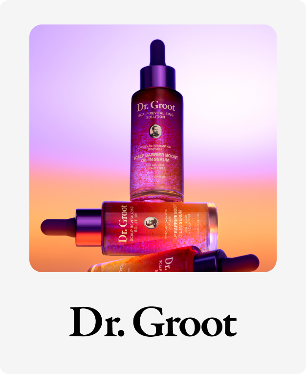 A purple Dr. Groot hair thickening solution bottle partially submerged in water with droplets falling, and the brand name Dr. Groot.