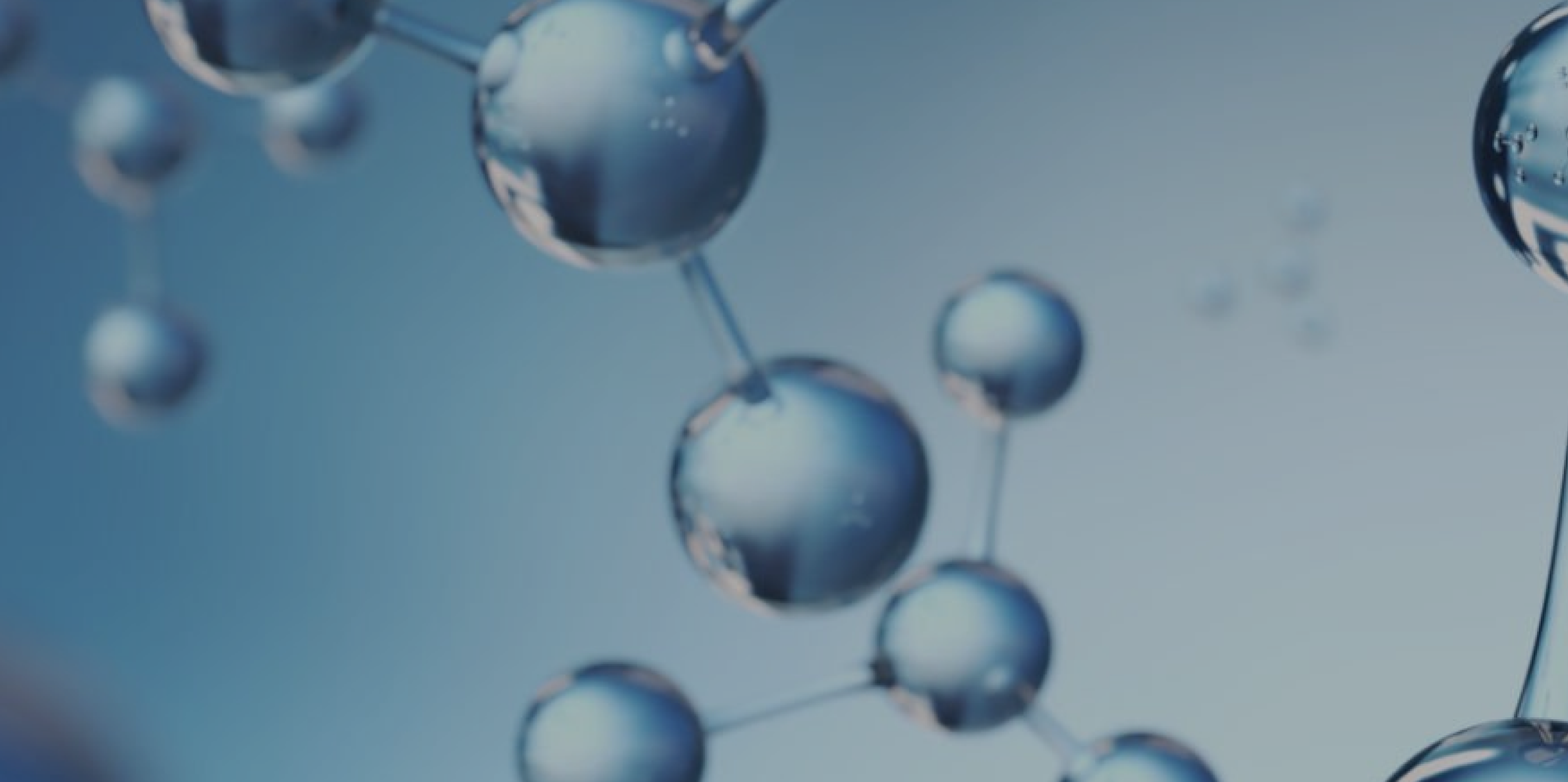 Abstract image of atoms and molecules in light blue shades