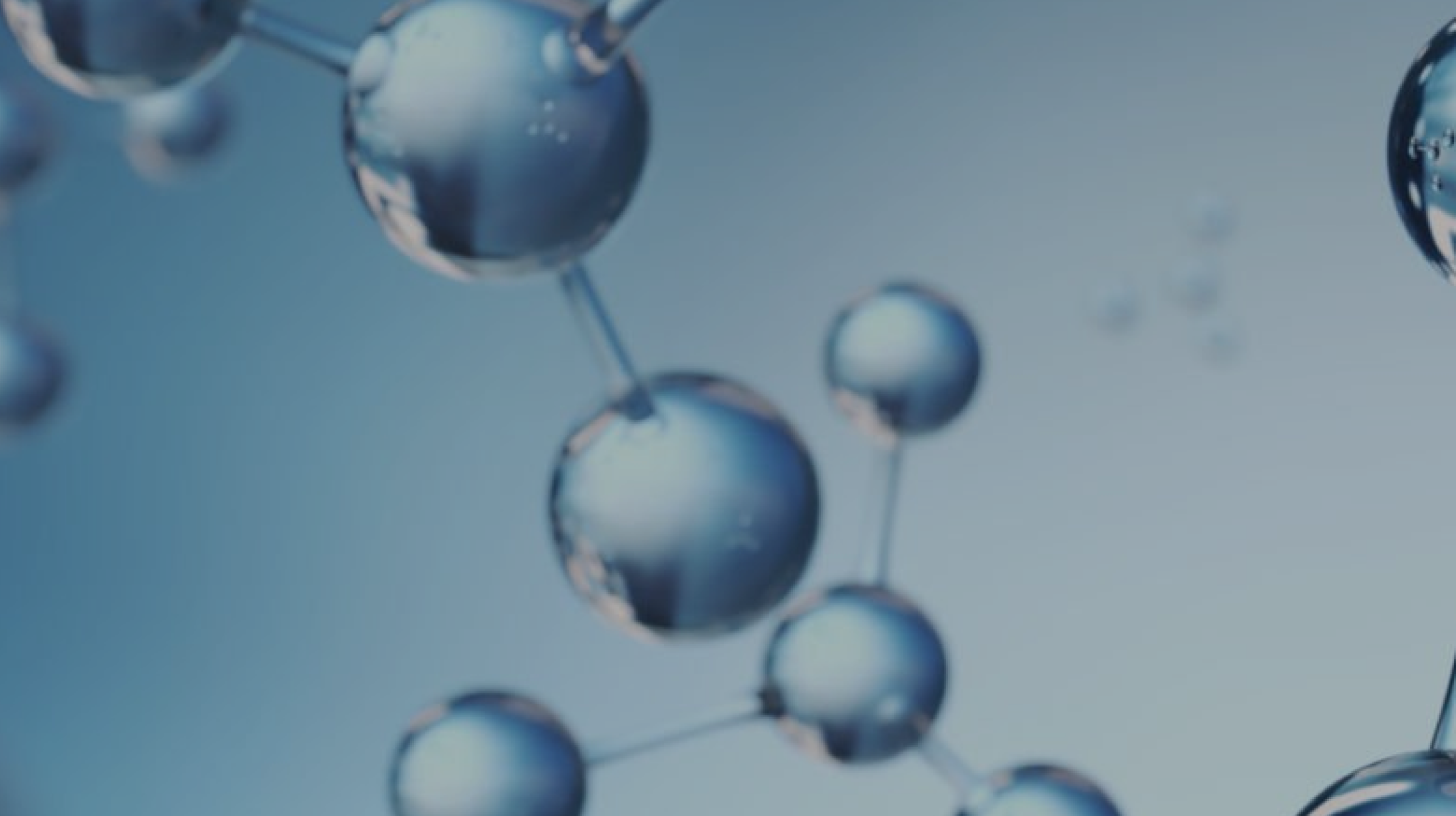 Abstract image of atoms and molecules in light blue shades