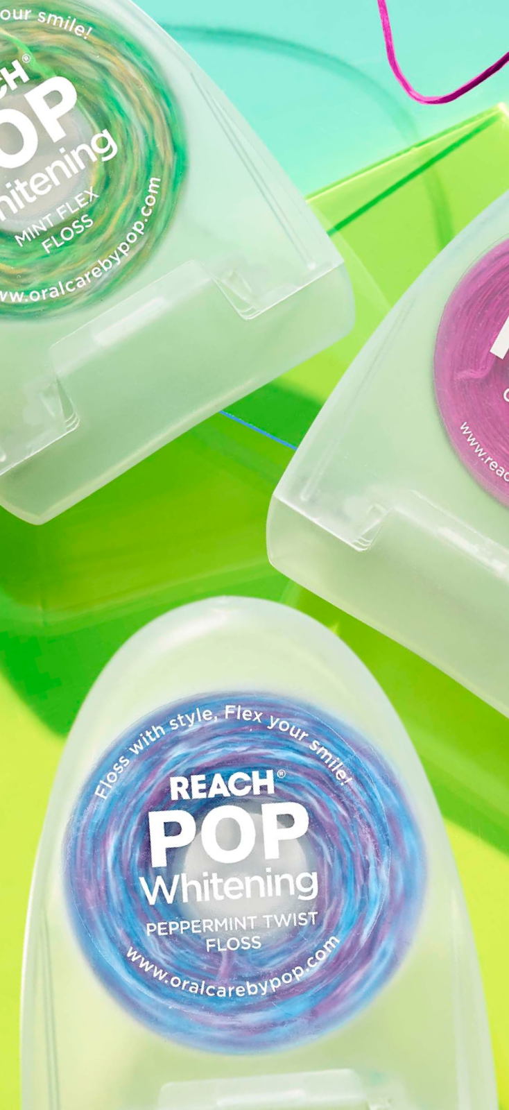Three boxes of different Reach Pop Floss