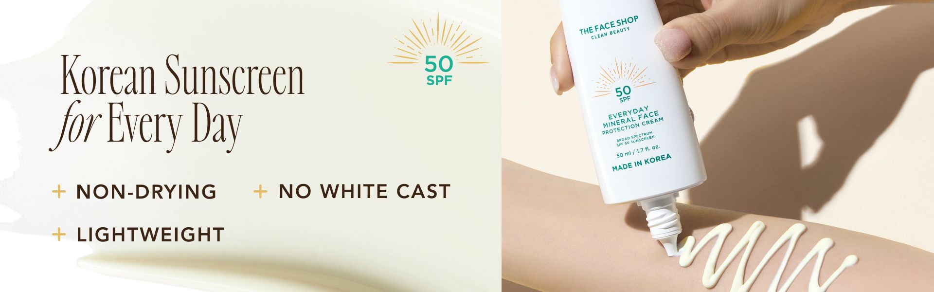 A hand is squeezing a tube of Everyday Mineral Face Protection Cream with SPF 50 onto an arm. The text on the image reads, "The Face Shop Clean Beauty, Korean Formula for Summer Fun, Water Resistant for up to 40 minutes, Made in Korea.