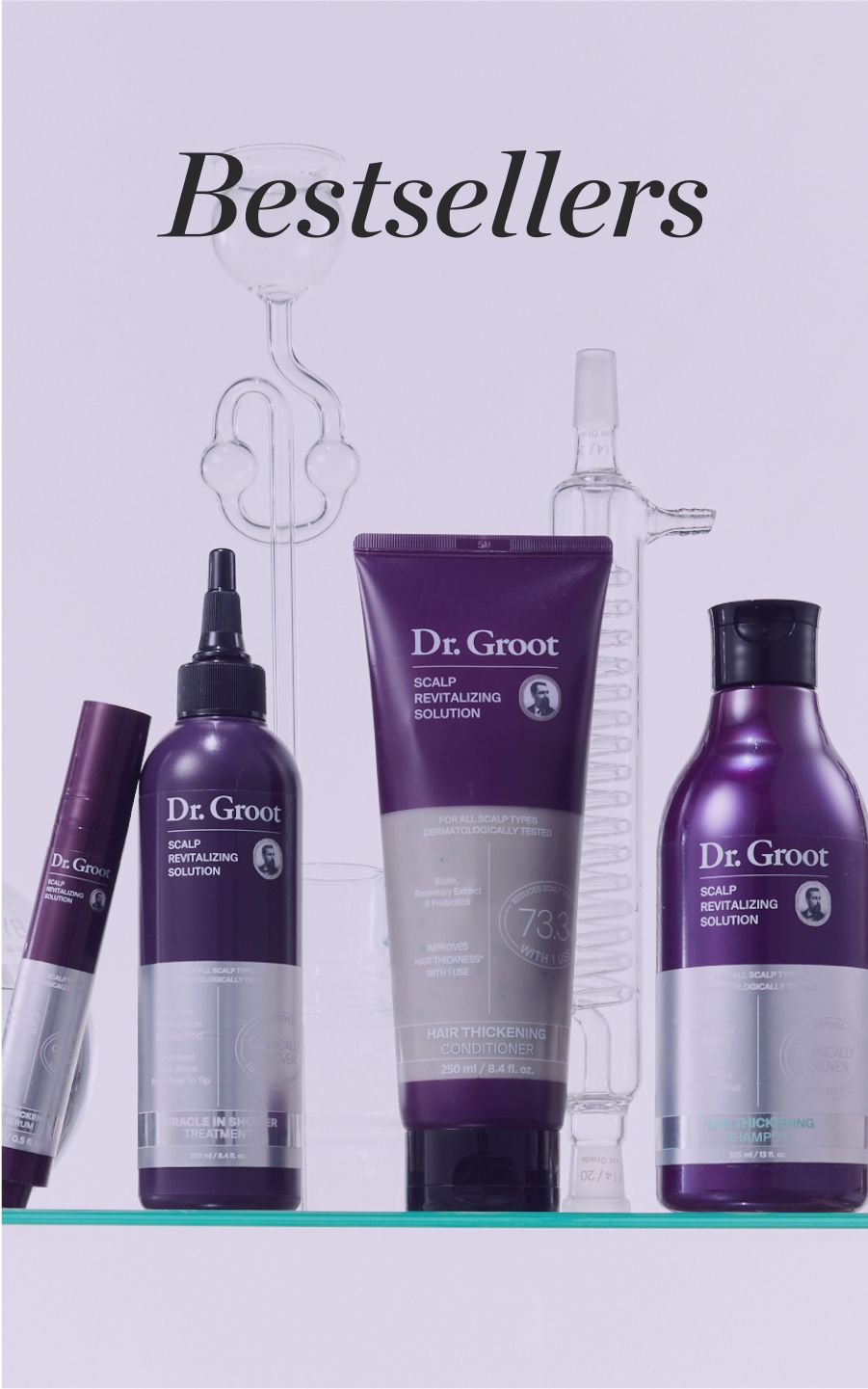 "Bestsellers" text above multiple purple Dr. Groot Scalp Revitalizing Solution hair products on a shelf with scientific glassware behind them.