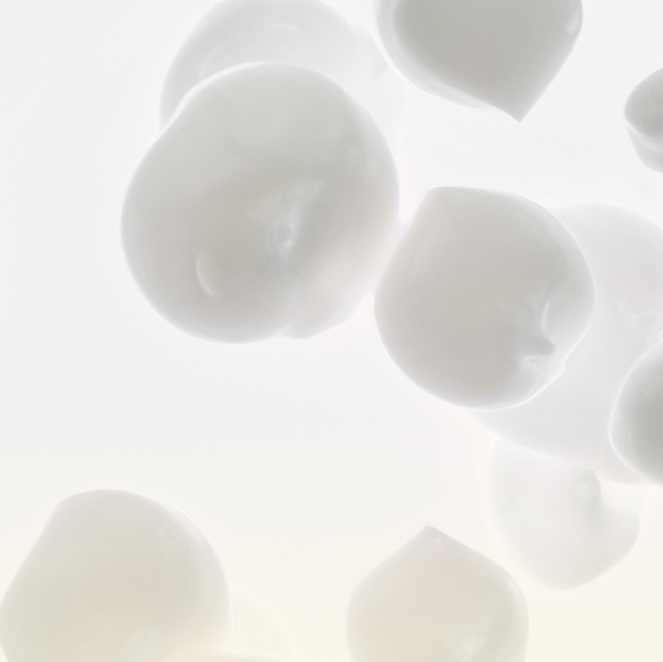 A cluster of white bubbles suspended in mid-air, creating a whimsical and ethereal atmosphere.