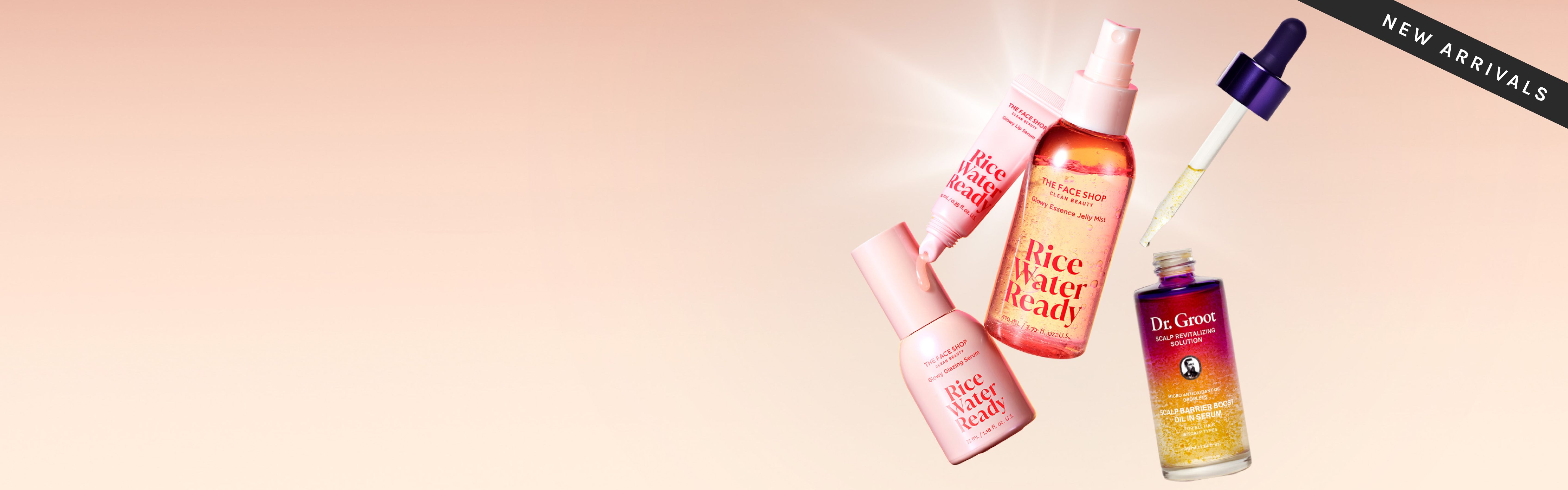 Three pink "Rice Water Ready" skincare products and a purple-to-gold serum dropper bottle, with a "New Arrivals" banner, on a light peach background.