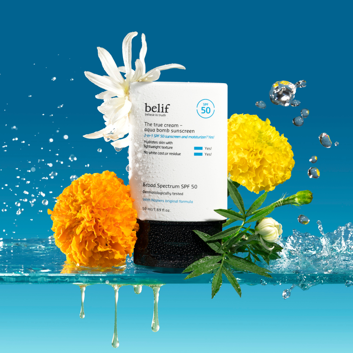 A tube of belif the true cream – aqua bomb sunscreen with a spread of floral & herbal ingredients for moisturization