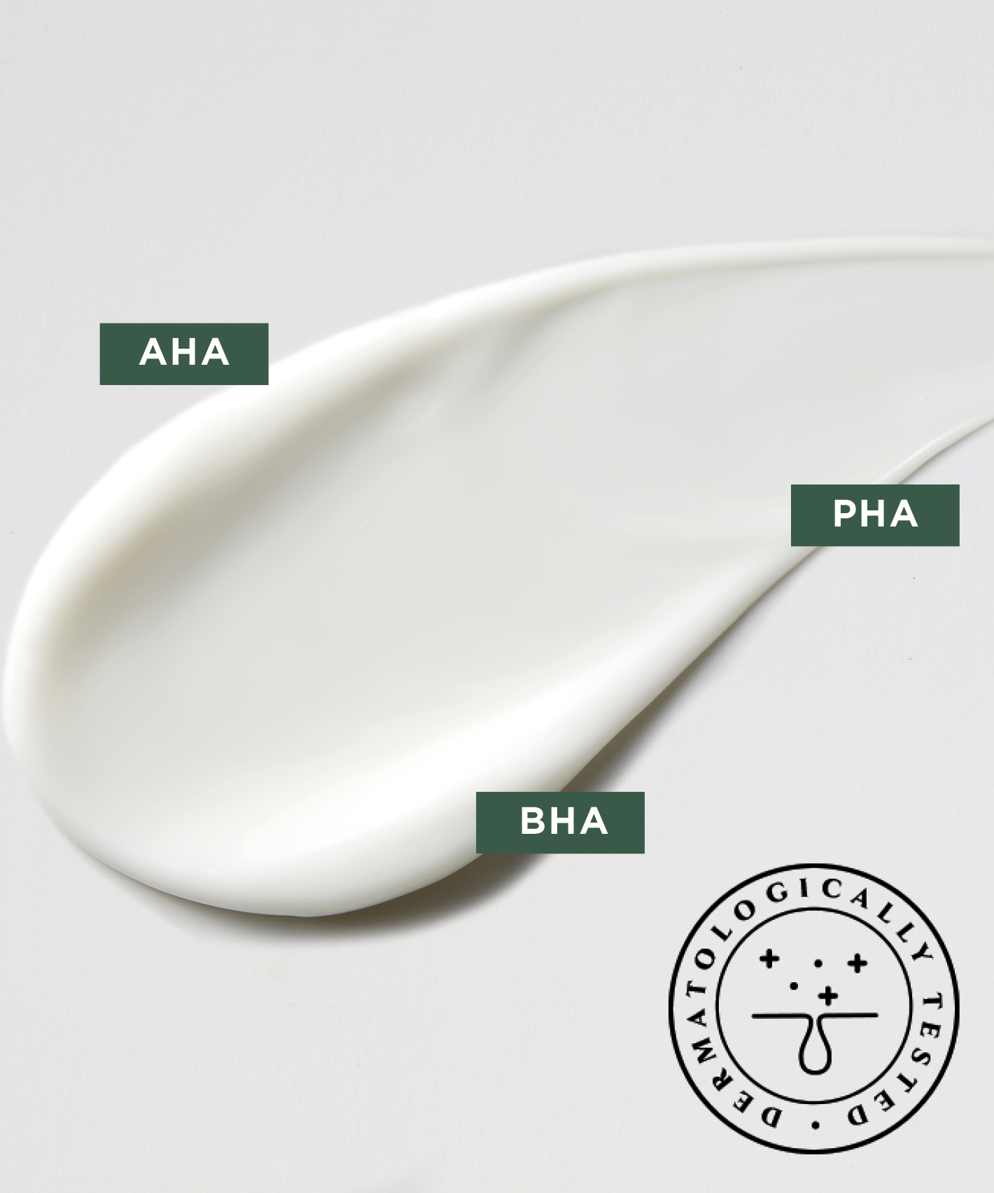 A white spread of The Face Shop Cream on a white surface with three abbreviations attached to it: AHA, PHA, BHA and a stamp saying "Dermatologically Approved"