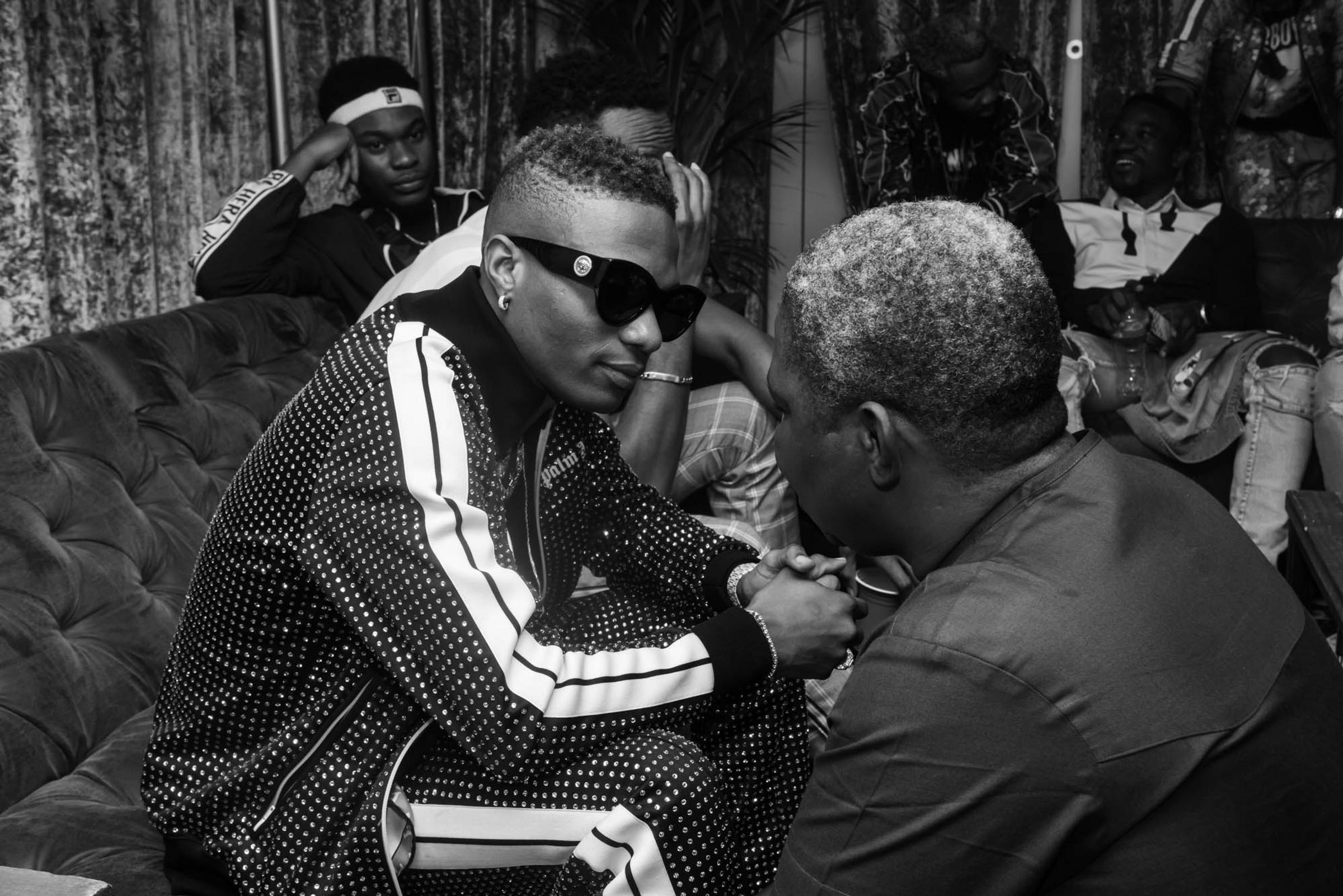 London, United Kingdom. 26th May 2018. Manger Mr Sunday Are speaking to Wizkid before going on stage for his Afrorepublik concert at the 02 Arena. Photographed Michael Tubes.