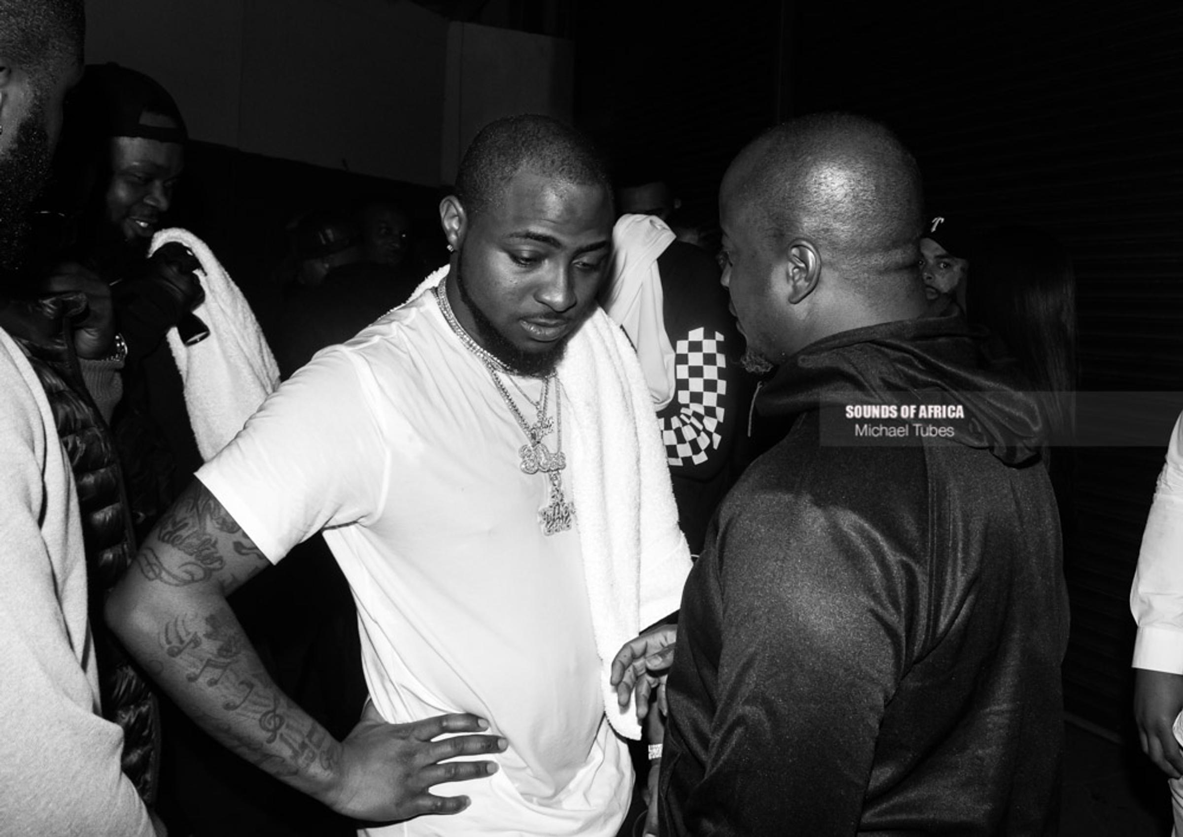 Birmingham, UK. 18th February, 2018. Backstage:Davido speaking to Efe Ogbeni after his performance during his UK tour . Photographed Michael Tubes.