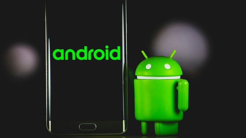 Hand holding smartphone with social media content