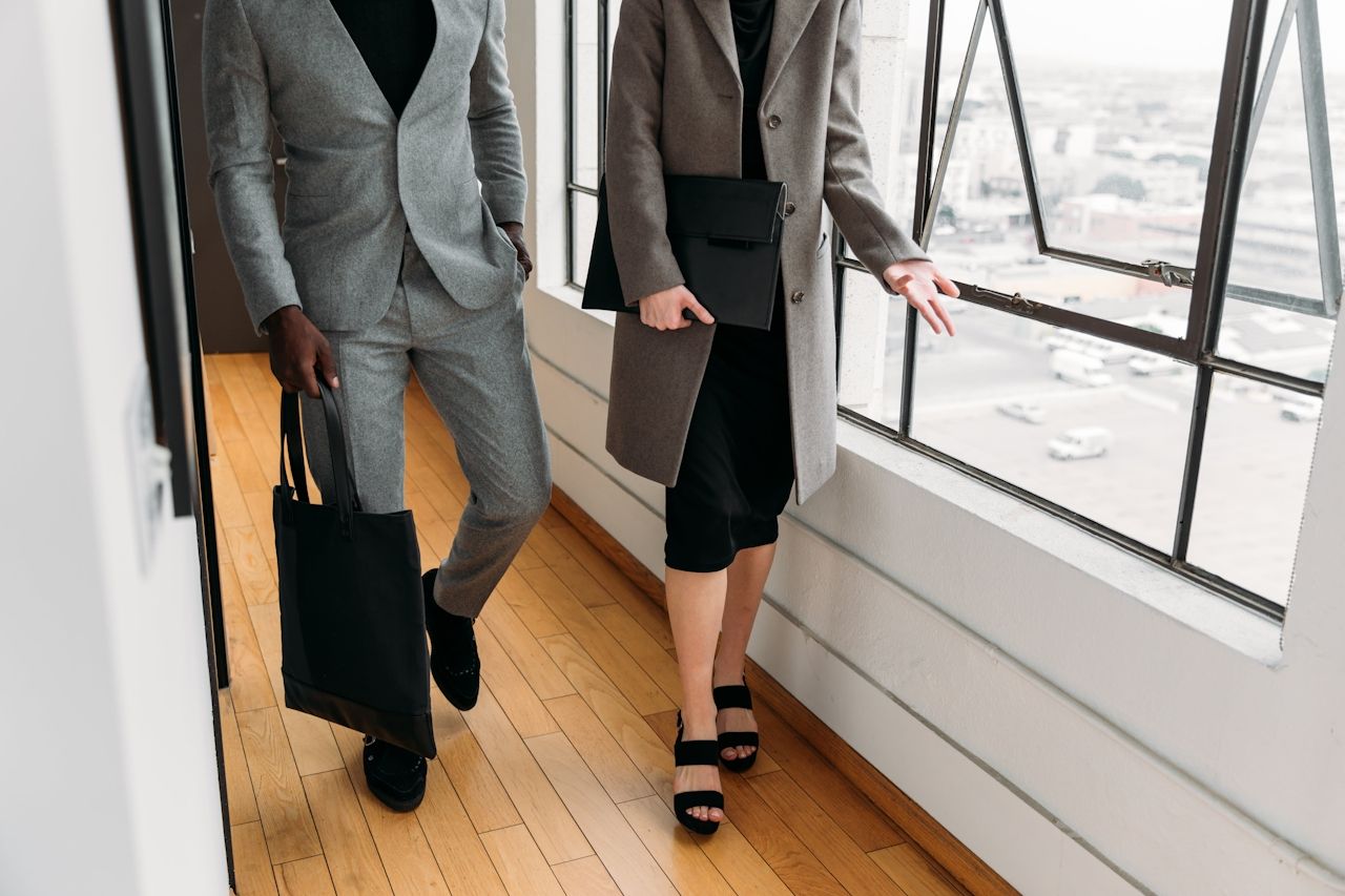 Office worker walking down hallway during interview.