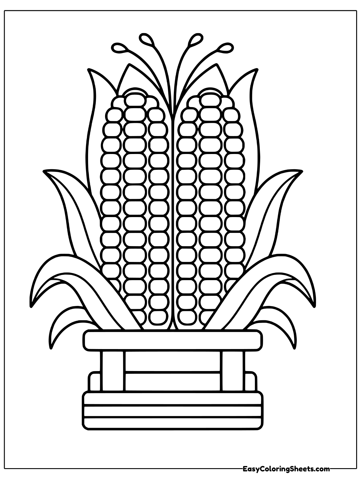 Two tall ears of corn stand side by side on a wooden stand with their leafy husks spreading out.