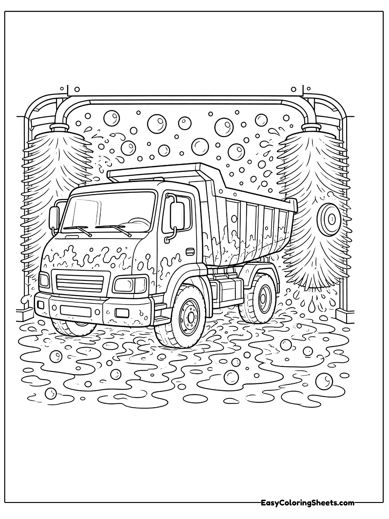 A big dump truck drives through a car wash with spinning brushes and soapy bubbles all around it.