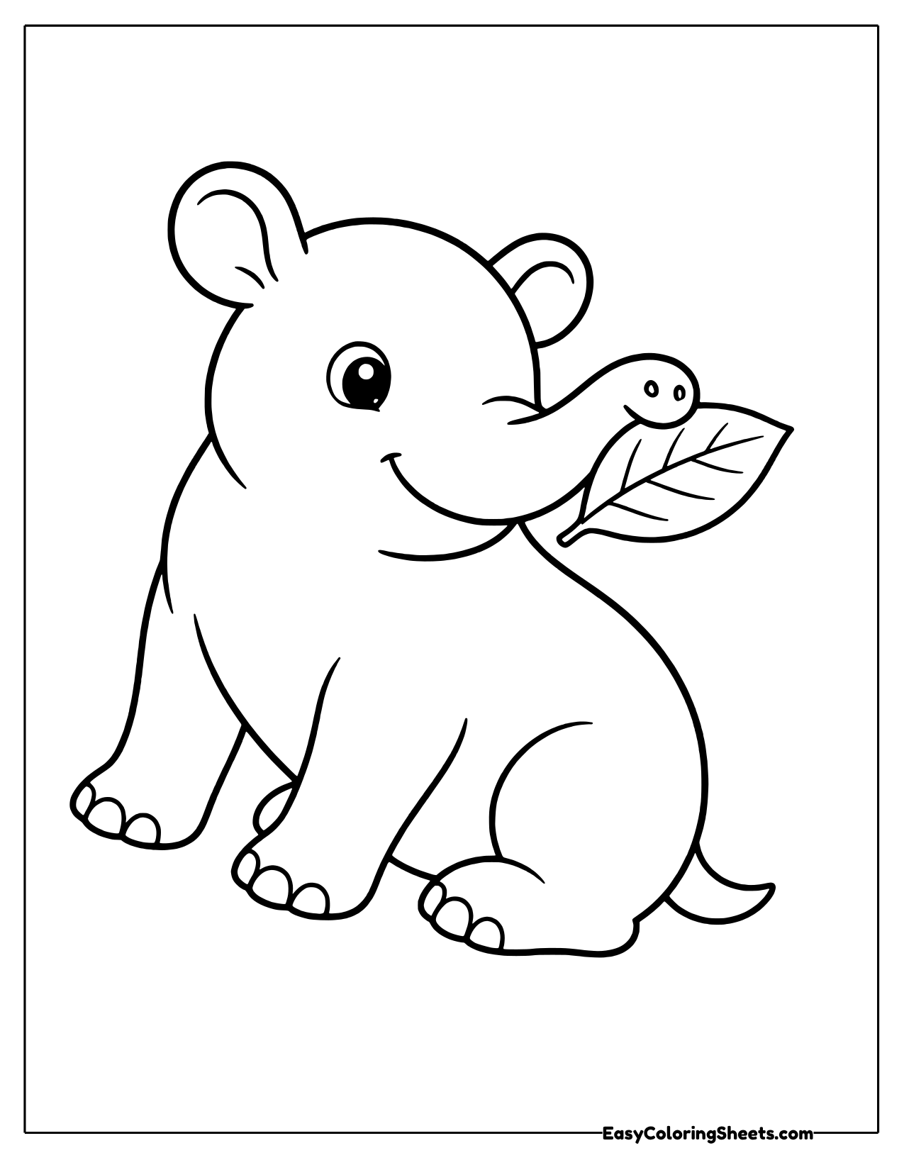 Tapir holding a leaf in its snout