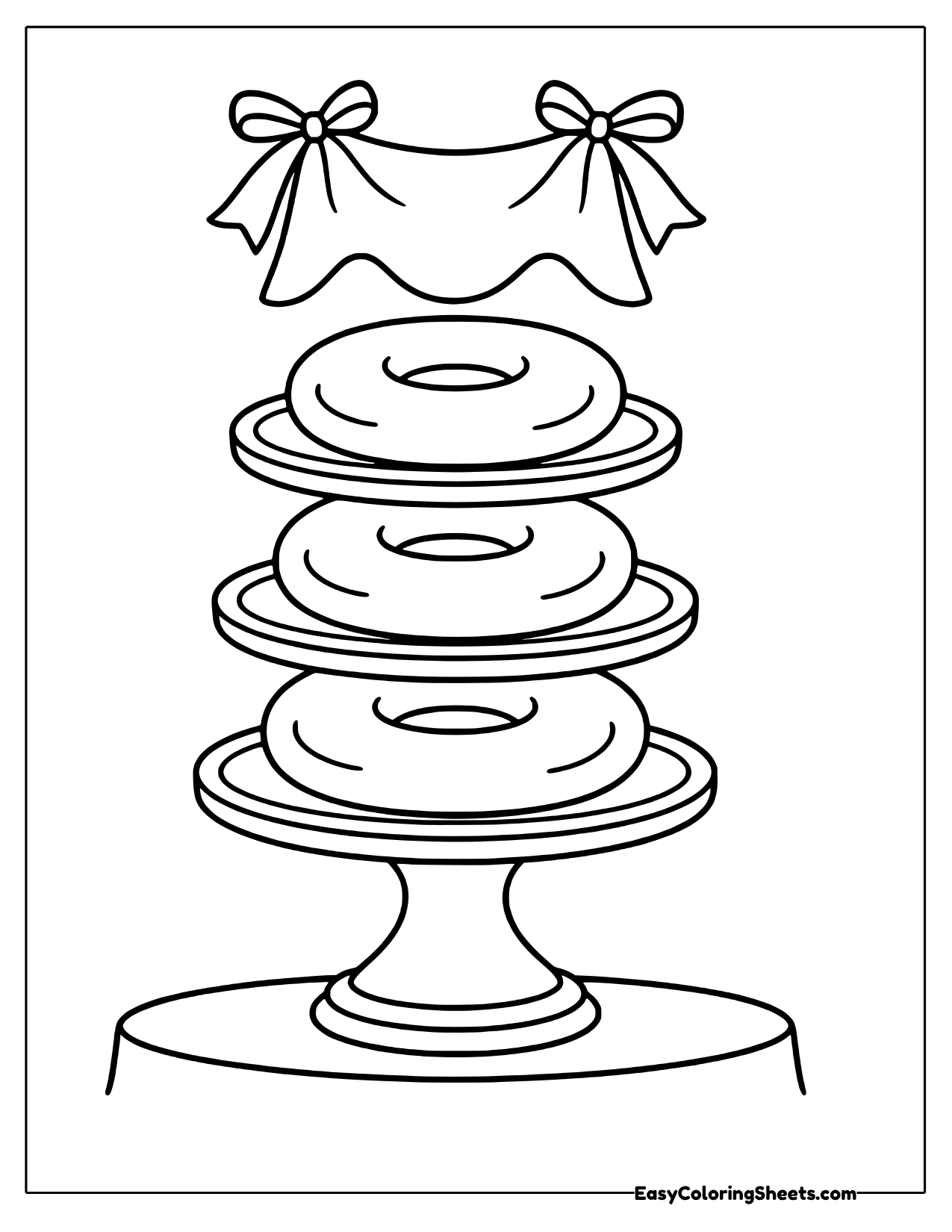 Bagels stacked on a cake stand with a bow