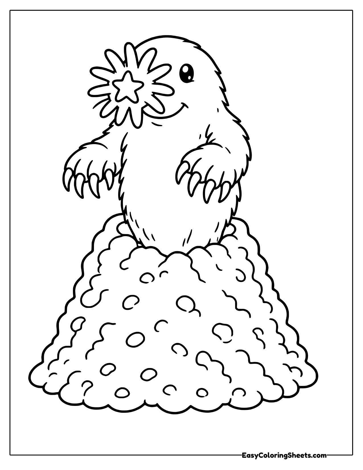 Star-nosed mole on top of a dirt mound
