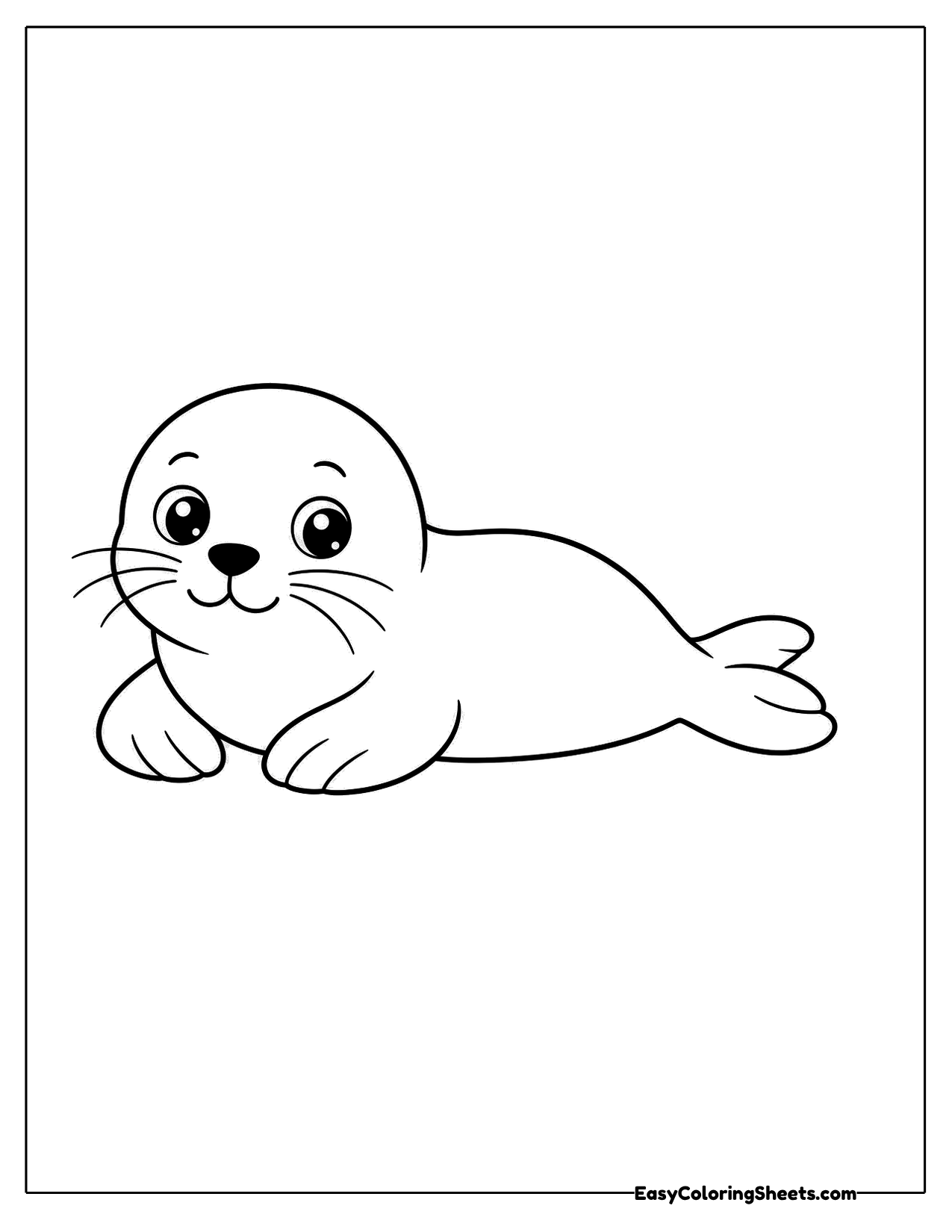 Baby seal lying on its belly with whiskers