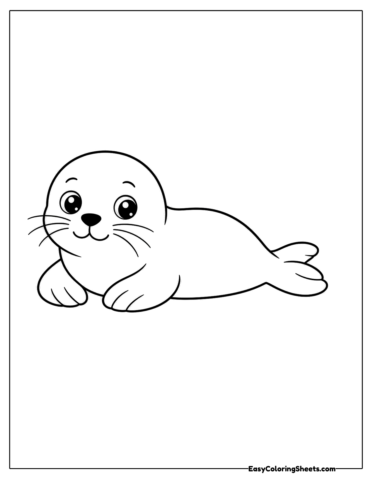 Baby seal lying on its belly with whiskers