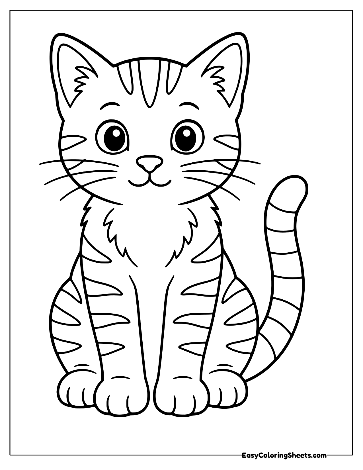 Tabby cat sitting with striped fur