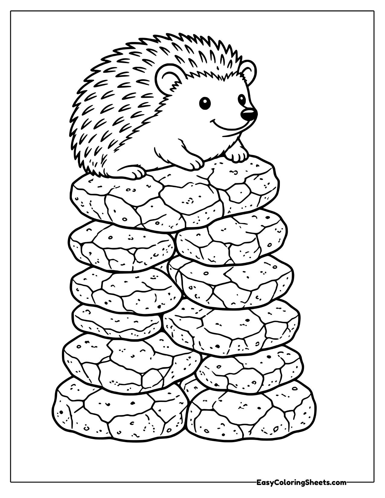 Hedgehog sitting on top of a tall pile of speckled stones