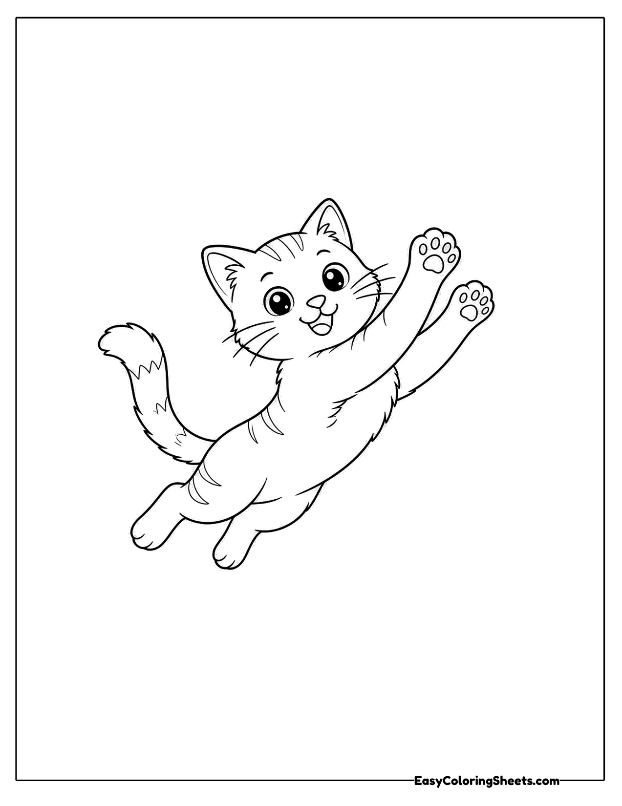 Kitten leaping up with one paw raised