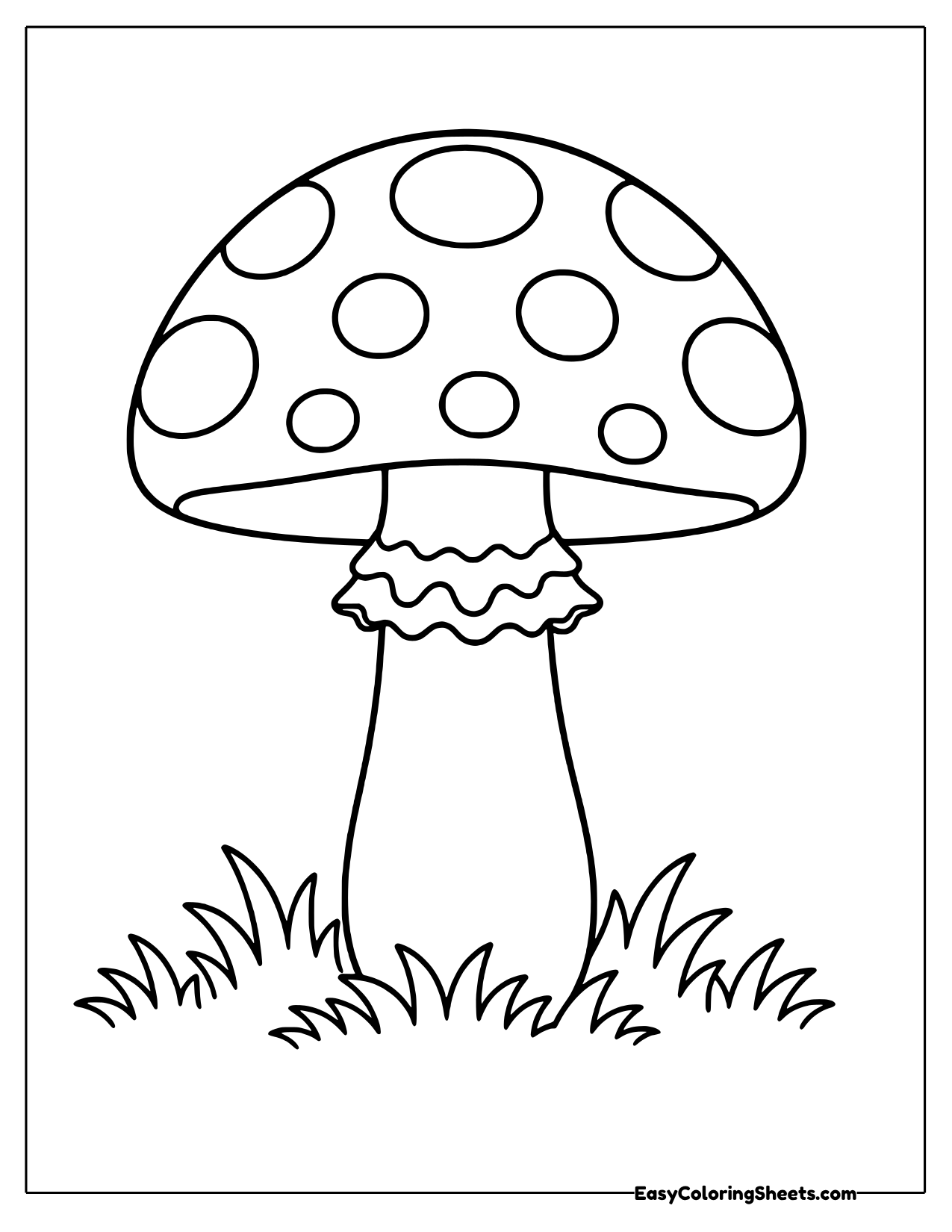 Tall toadstool in grass