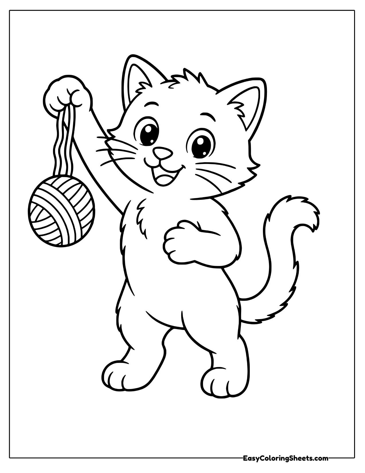 Kitten batting at a dangling ball of yarn