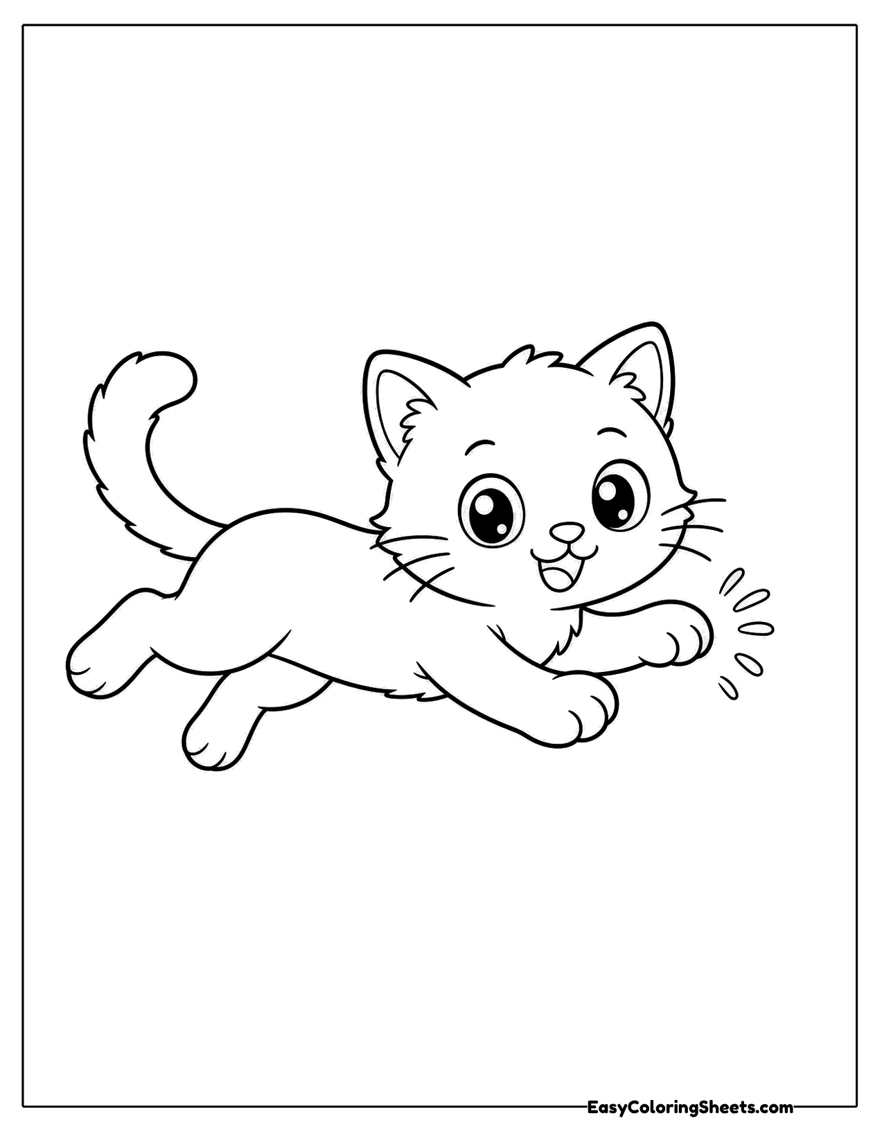 Playful kitten leaping forward