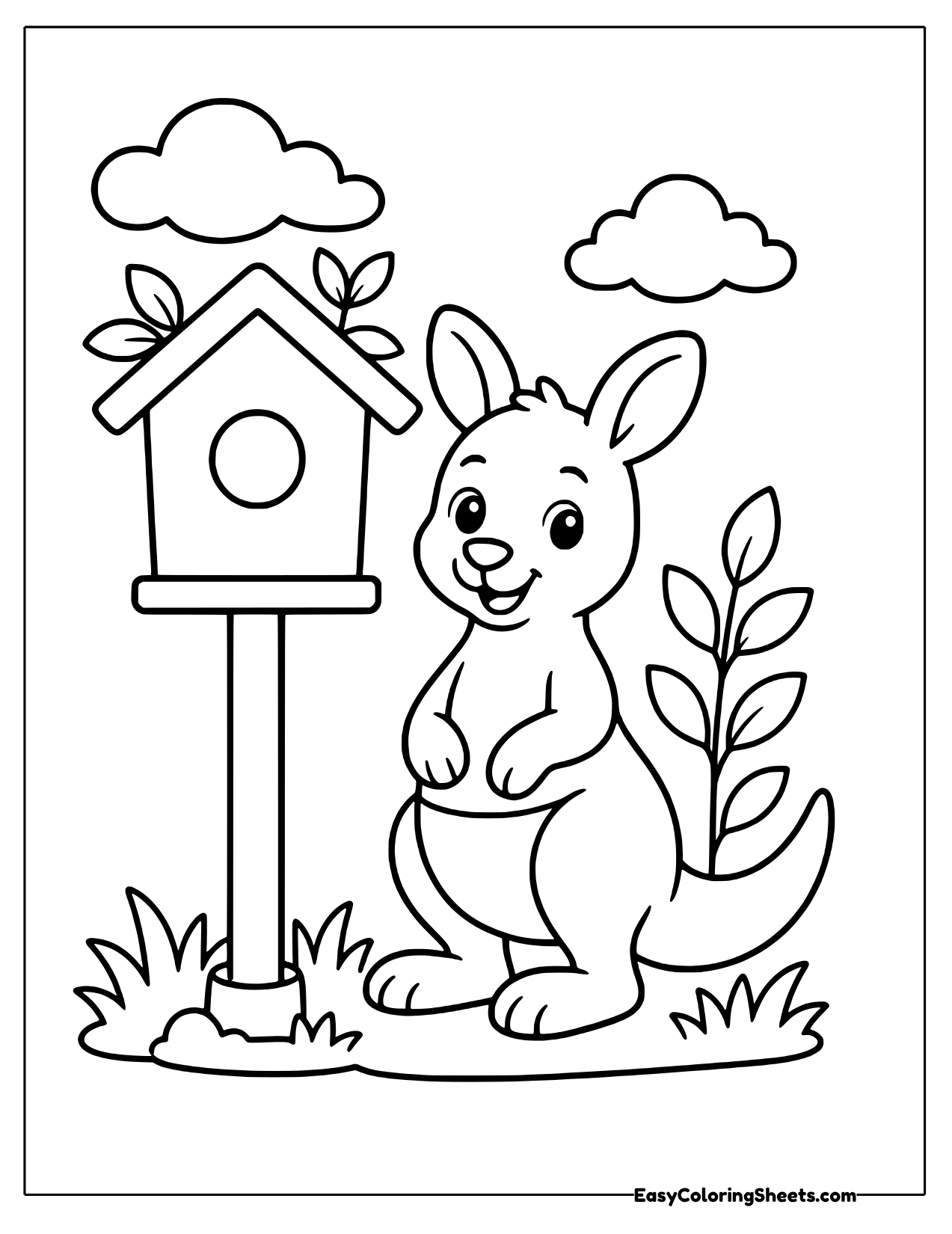 Kangaroo standing beside a birdhouse on a pole