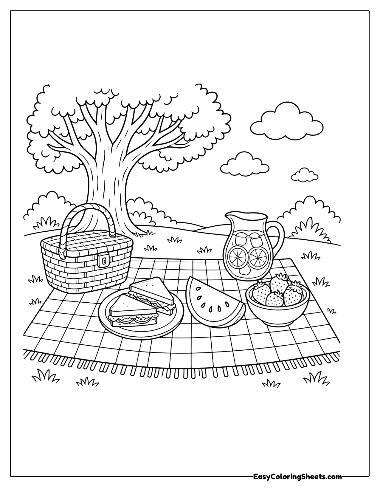 Picnic in the park with a basket and blanket