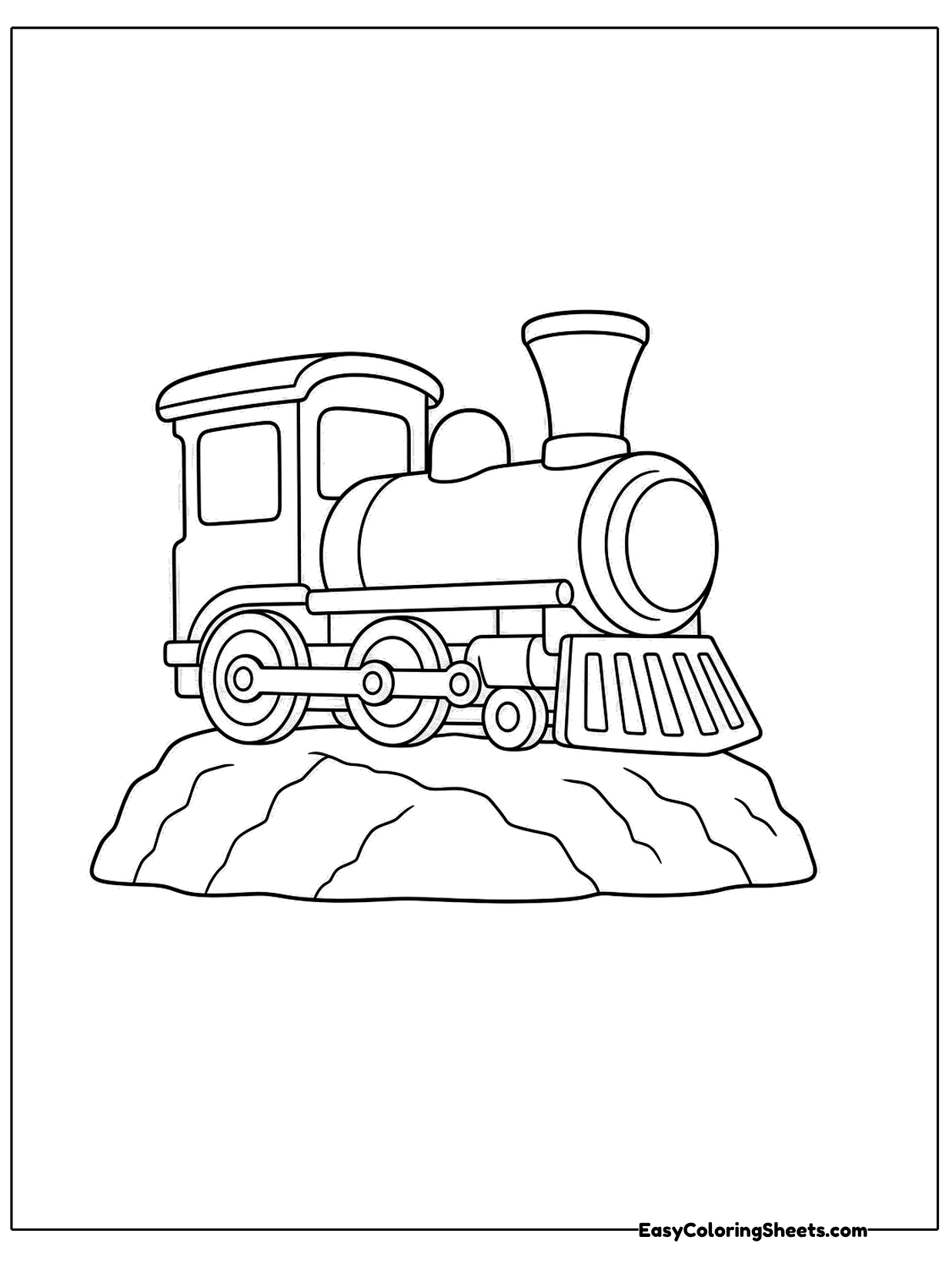 A small steam locomotive rests atop a lumpy rocky mound.