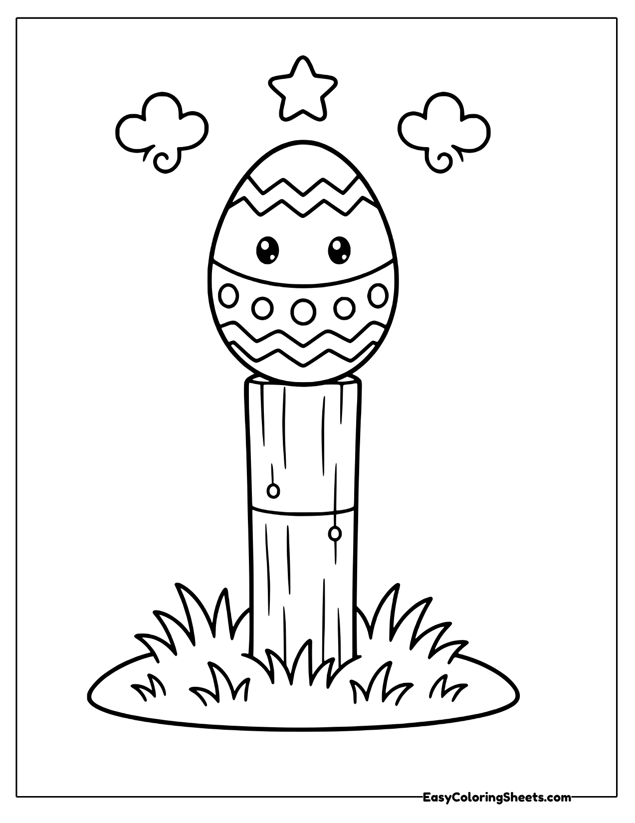 Easter egg sitting on a fence post