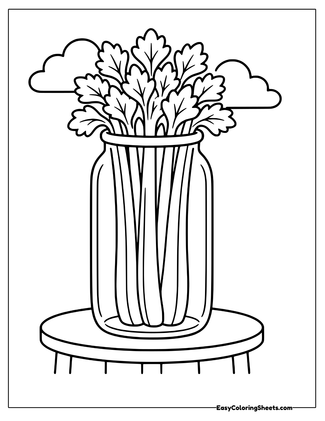 Celery stalks standing in a glass jar