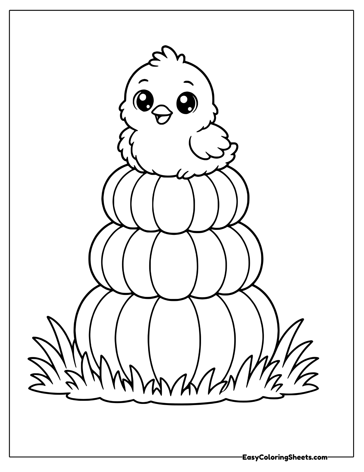 Chick sitting on three stacked pumpkins