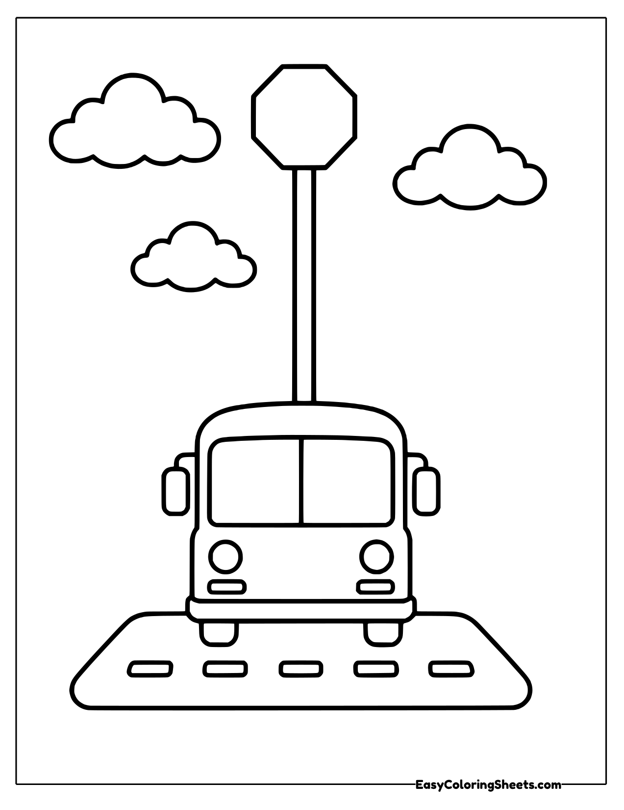 Bus waiting at a stop sign