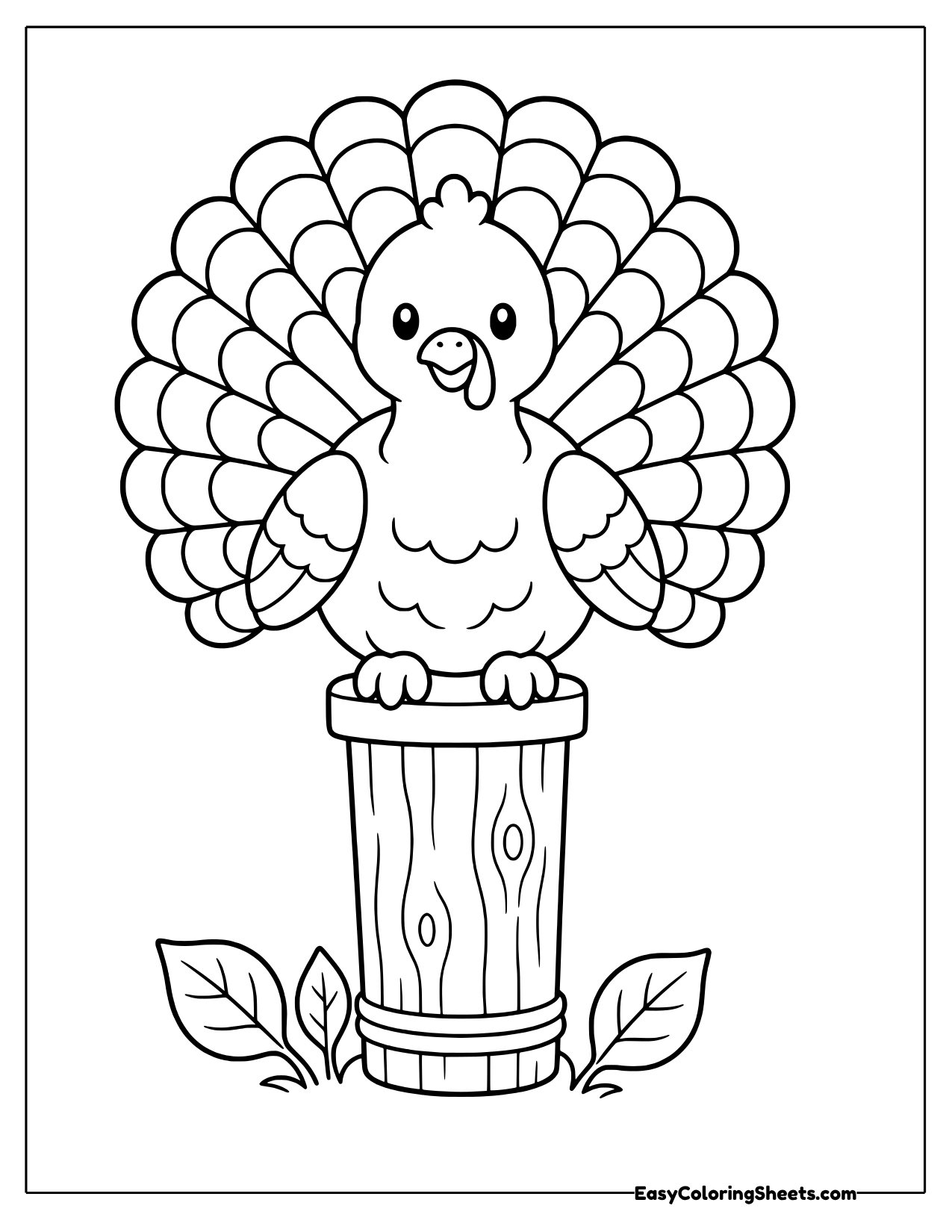 Turkey with a fanned tail sitting on a wooden fence post