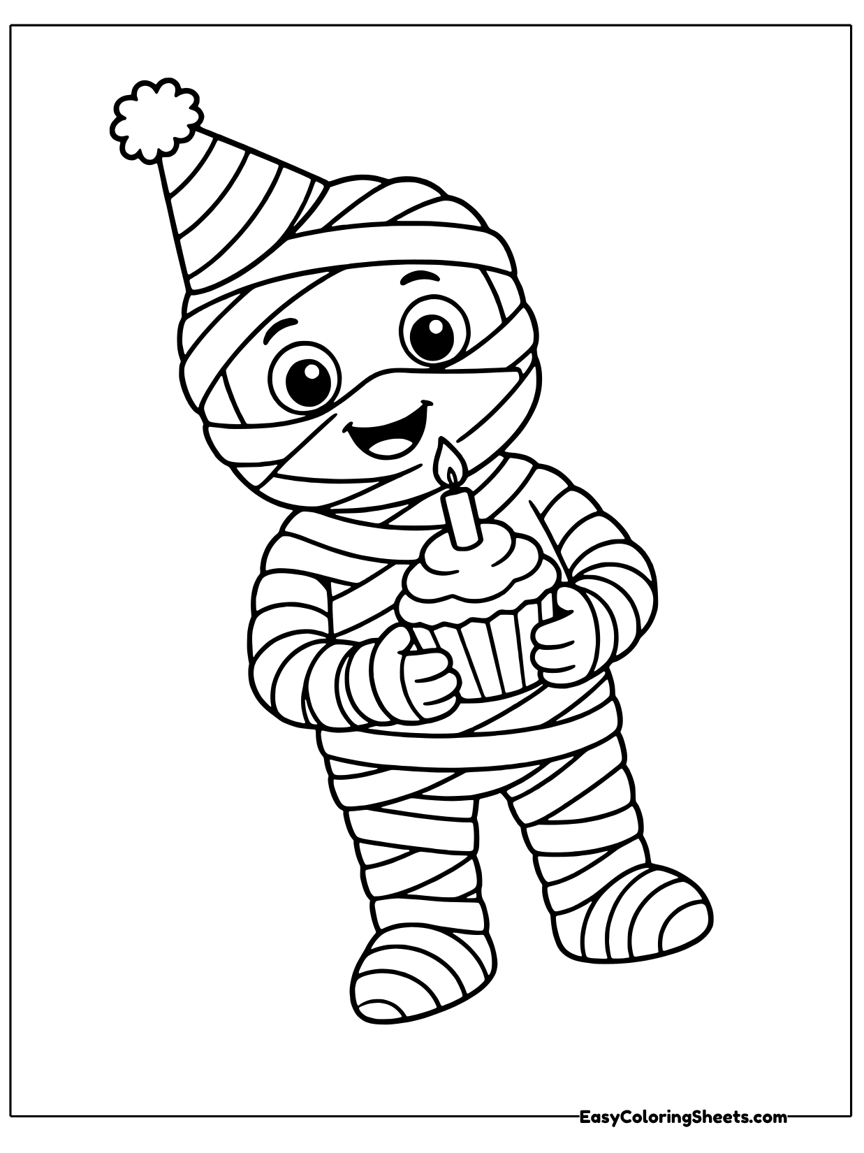 A mummy wearing a pointed party hat holds a cupcake with a candle.